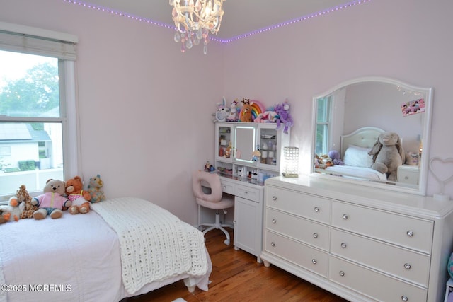 630 Springfield Ave, Pine Beach, NJ 08741 - bedroom featuring wood finished floors and a chandelier
