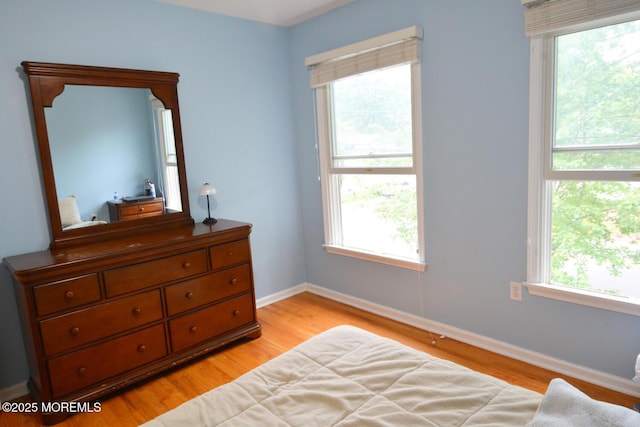 630 Springfield Ave, Pine Beach, NJ 08741 - bedroom with light wood-type flooring and baseboards