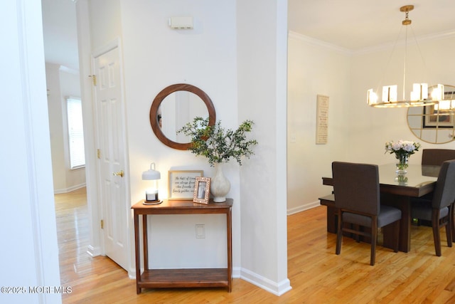 630 Springfield Ave, Pine Beach, NJ 08741 - dining room featuring a chandelier, wood finished floors, baseboards, and crown molding