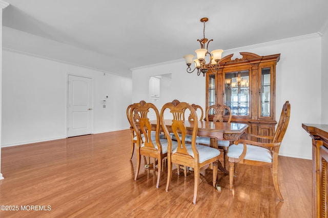 235 Prince Charles Ct, Toms River, NJ 08757 - dining space featuring a chandelier, ornamental molding, light wood-style floors, and baseboards
