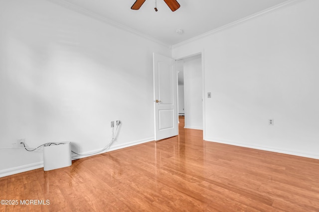235 Prince Charles Ct, Toms River, NJ 08757 - unfurnished room featuring a ceiling fan, ornamental molding, wood finished floors, and baseboards