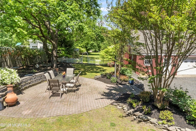 view of patio featuring outdoor dining area