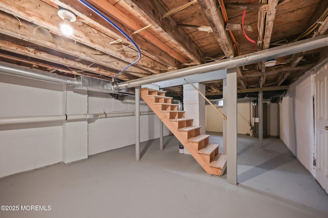 unfinished basement with stairway