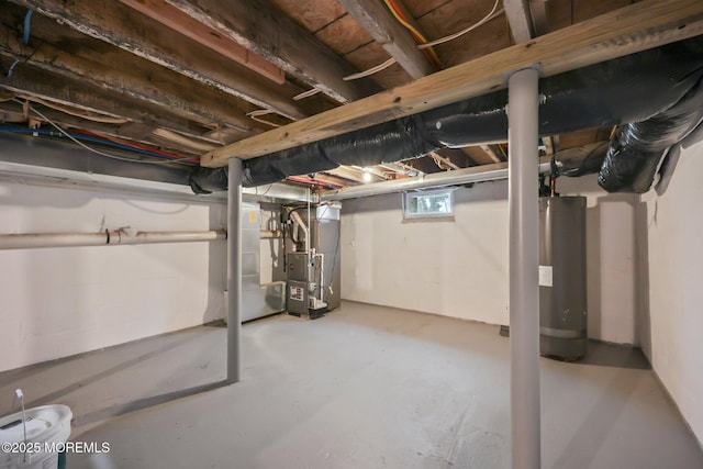 below grade area with gas water heater and heating unit