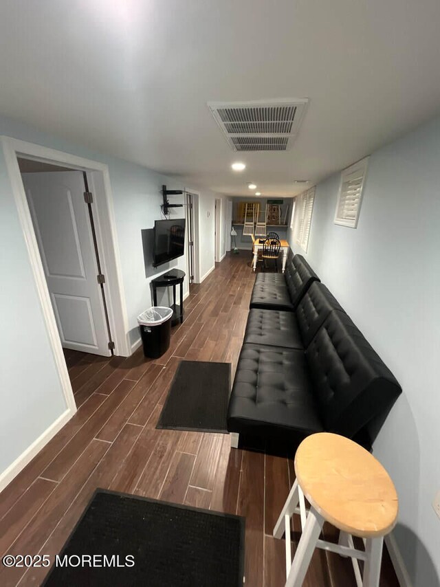 324 Webster Ave, Seaside Heights, NJ 08751 - living room with dark wood-style floors and baseboards