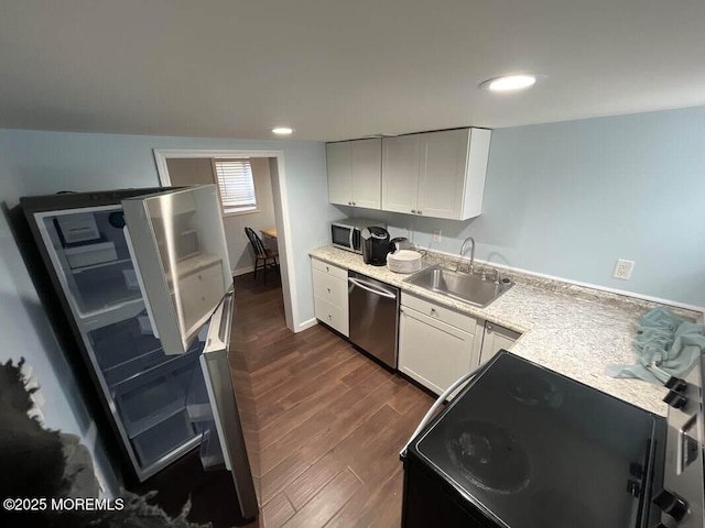 324 Webster Ave, Seaside Heights, NJ 08751 - kitchen with a sink, stainless steel appliances, light countertops, white cabinets, and recessed lighting