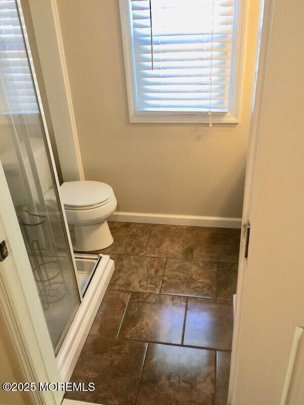 324 Webster Ave, Seaside Heights, NJ 08751 - full bathroom with a shower stall, toilet, and baseboards