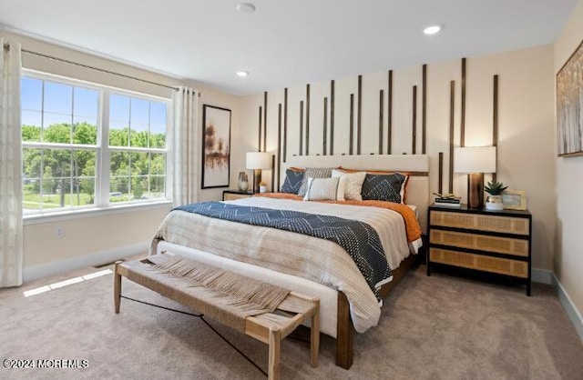 bedroom with baseboards, carpet floors, and recessed lighting