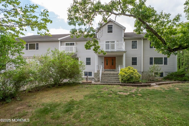 144-146 E Greystone Rd, Old Bridge, NJ 08857 - rear view of house with a yard and a balcony