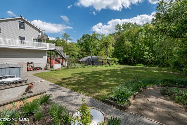 144-146 E Greystone Rd, Old Bridge, NJ 08857 - view of green lawn with stairs and a patio