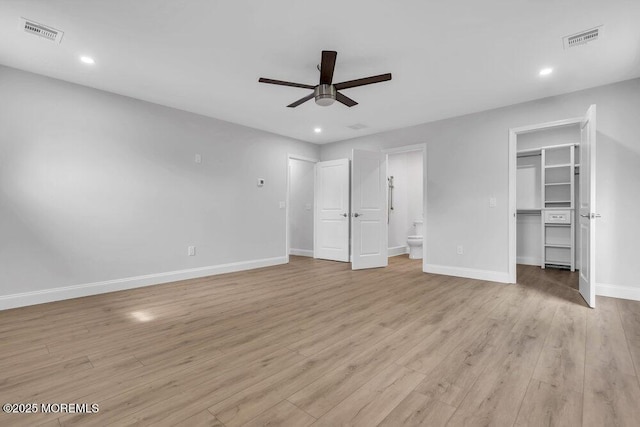 7 Leifried Ln, Tuckerton, NJ 08087 - unfurnished bedroom with baseboards, a spacious closet, light wood-style floors, recessed lighting, and ensuite bathroom