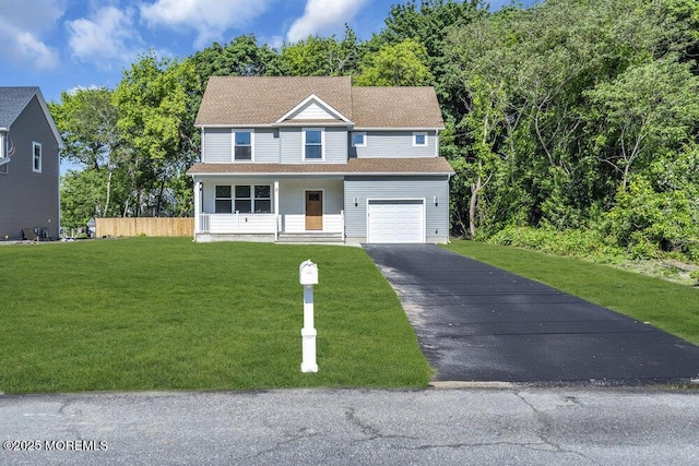 7 Leifried Ln, Tuckerton, NJ 08087 - view of front of house with driveway, a front yard, a garage, and a porch