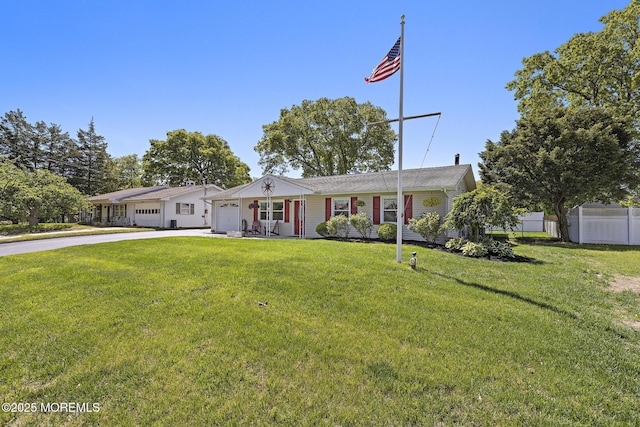 single story home with an attached garage and driveway