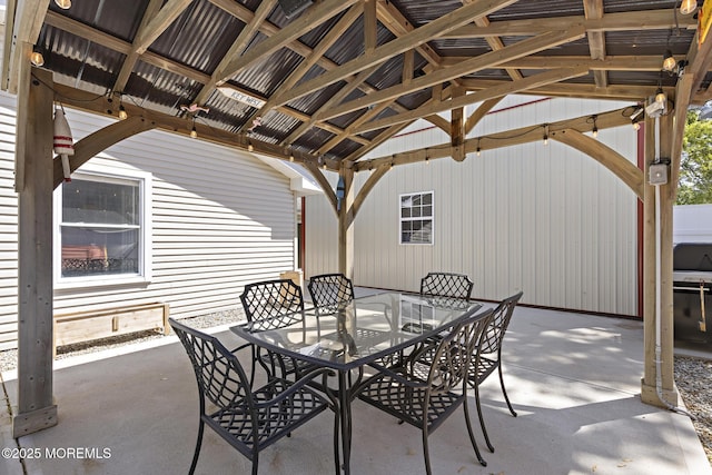 view of patio / terrace featuring a gazebo and outdoor dining space