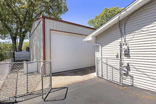 garage with fence