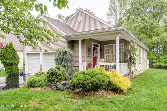 view of front of home with an attached garage, covered porch, a front yard, driveway, and a shingled roof