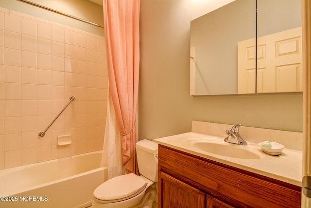 bathroom featuring toilet, vanity, and shower / tub combo with curtain