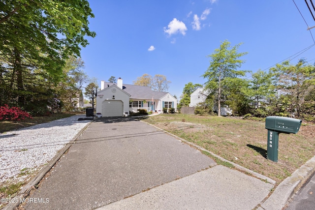 316 Nautilus Dr, Manahawkin, NJ 08050 - view of front of property featuring asphalt driveway and an attached garage