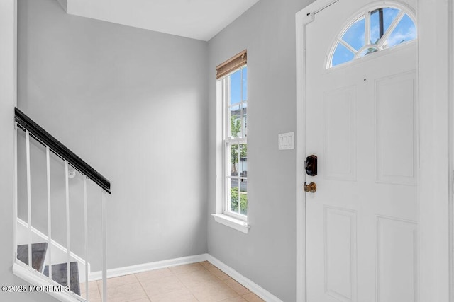 3 Kuczynski Dr Unit 944, Parlin, NJ 08859 - entrance foyer with plenty of natural light, stairs, baseboards, and light tile patterned floors