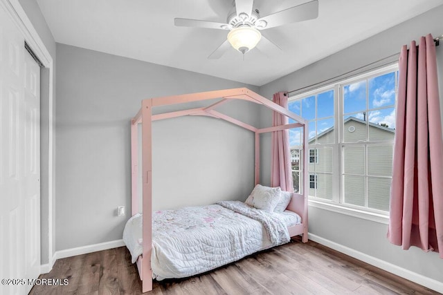3 Kuczynski Dr Unit 944, Parlin, NJ 08859 - bedroom with wood finished floors, baseboards, and a ceiling fan