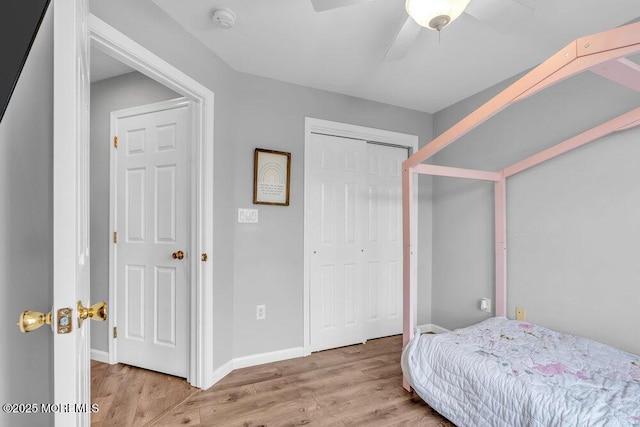 3 Kuczynski Dr Unit 944, Parlin, NJ 08859 - bedroom with wood finished floors, a ceiling fan, a closet, and baseboards