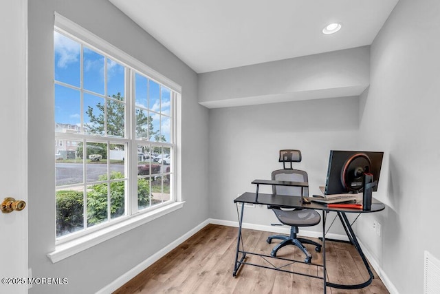 3 Kuczynski Dr Unit 944, Parlin, NJ 08859 - home office with healthy amount of natural light, wood finished floors, and baseboards