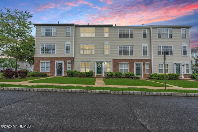 3 Kuczynski Dr Unit 944, Parlin, NJ 08859 - view of property with brick siding and a lawn