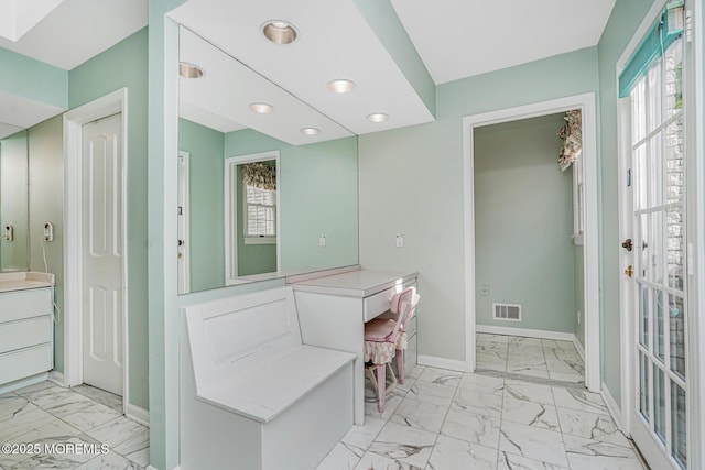 full bathroom featuring marble finish floors, plenty of natural light, baseboards, and recessed lighting