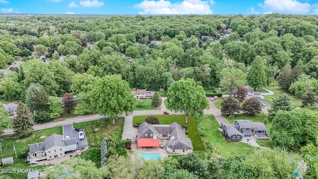 drone / aerial view of a heavily wooded area