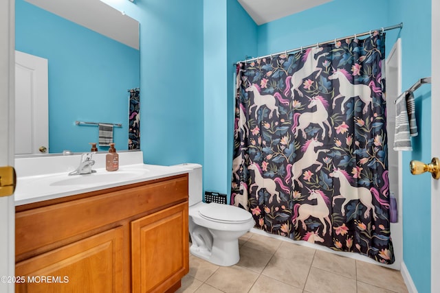 full bath with tile patterned floors, toilet, vanity, and curtained shower