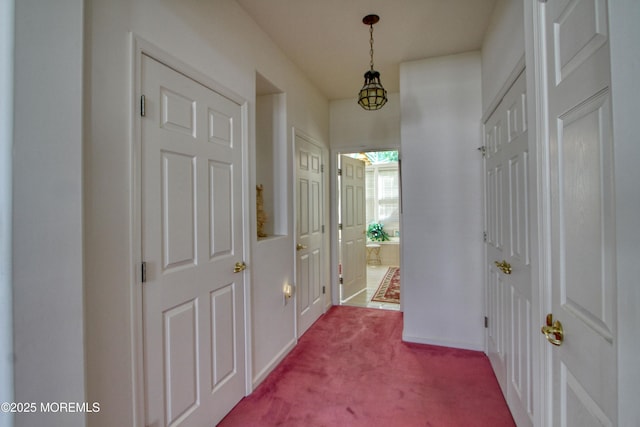 10 Lakeland Dr, Barnegat, NJ 08005 - hallway with dark colored carpet and baseboards