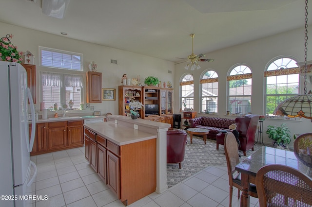 10 Lakeland Dr, Barnegat, NJ 08005 - kitchen with white appliances, light tile patterned floors, light countertops, and ceiling fan