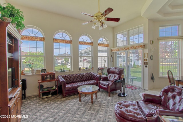 10 Lakeland Dr, Barnegat, NJ 08005 - living area with a ceiling fan, baseboards, a towering ceiling, and carpet flooring