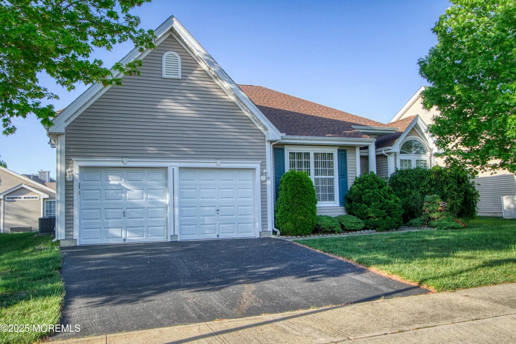 10 Lakeland Dr, Barnegat, NJ 08005 - ranch-style home featuring driveway, an attached garage, a front lawn, and a shingled roof