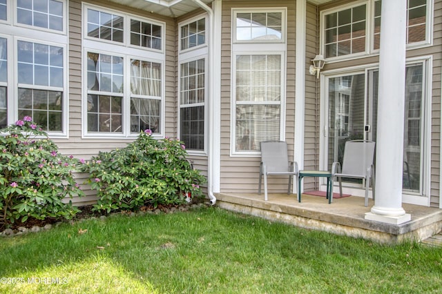 10 Lakeland Dr, Barnegat, NJ 08005 - view of exterior entry featuring covered porch and a yard