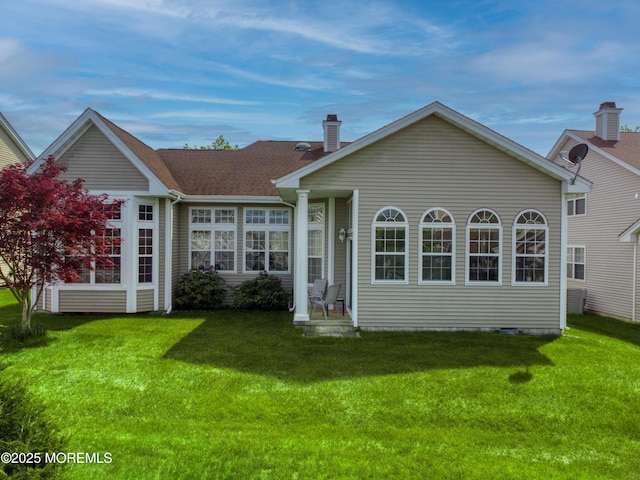 10 Lakeland Dr, Barnegat, NJ 08005 - back of house with a lawn and roof with shingles