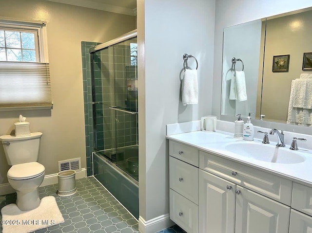 9 Darien Dr, West Long Branch, NJ 07764 - bathroom with toilet, vanity, baseboards, and enclosed tub / shower combo