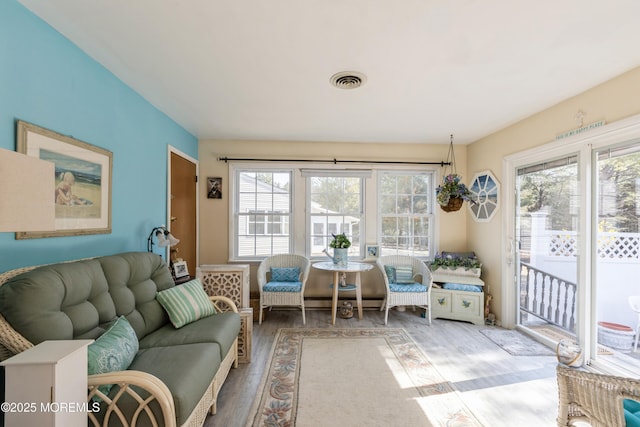 living area featuring wood finished floors