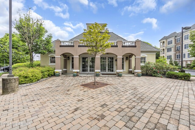 2210 Xanadu Ln, Wall, NJ 07719 - view of front of property with french doors and stucco siding