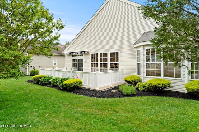 4 Augusta Dr, Little Egg Harbor, NJ 08087 - back of property featuring a lawn and roof with shingles