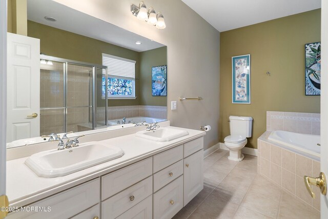 4 Augusta Dr, Little Egg Harbor, NJ 08087 - bathroom with tile patterned flooring, a garden tub, a stall shower, baseboards, and toilet