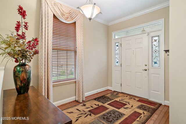 4 Augusta Dr, Little Egg Harbor, NJ 08087 - entrance foyer featuring wood finished floors, crown molding, and baseboards