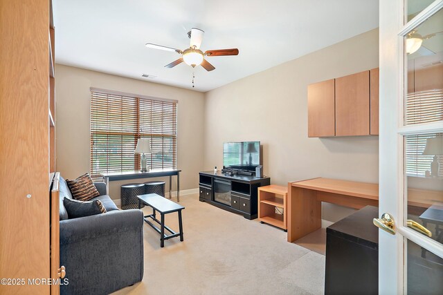 4 Augusta Dr, Little Egg Harbor, NJ 08087 - living room with a ceiling fan, plenty of natural light, and light colored carpet
