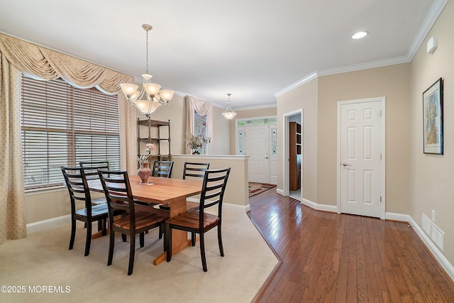 4 Augusta Dr, Little Egg Harbor, NJ 08087 - dining room with a chandelier, baseboards, wood finished floors, crown molding, and recessed lighting