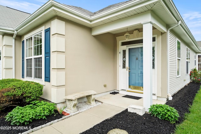 4 Augusta Dr, Little Egg Harbor, NJ 08087 - view of exterior entry featuring stucco siding