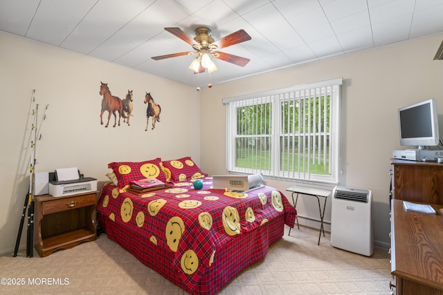 41D Cambridge Ct, Lakewood, NJ 08701 - bedroom with light carpet, a baseboard radiator, and a ceiling fan