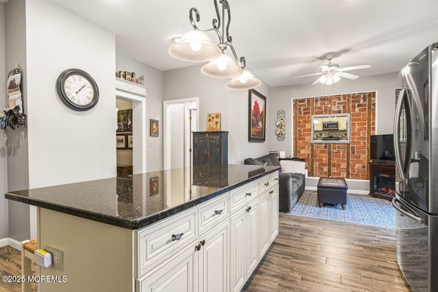 725 Province Line Rd, Allentown, NJ 08501 - kitchen with freestanding refrigerator, dark wood-style flooring, ceiling fan, white cabinets, and pendant lighting