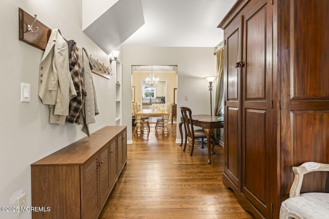 725 Province Line Rd, Allentown, NJ 08501 - hall with a chandelier, wood finished floors, and baseboards