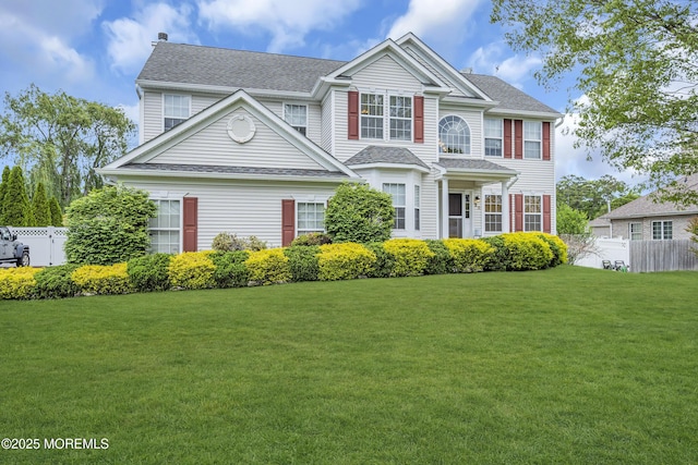 22 Ernest Dr, Lanoka Harbor, NJ 08734 - view of front facade with roof with shingles and a chimney