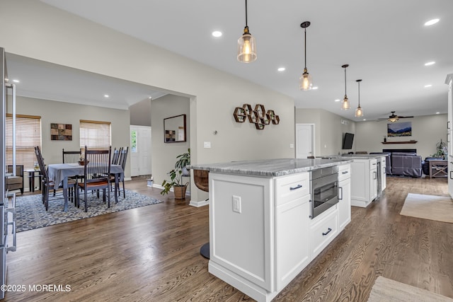 22 Ernest Dr, Lanoka Harbor, NJ 08734 - kitchen with open floor plan, ceiling fan, a center island, dark wood-style flooring, and decorative light fixtures